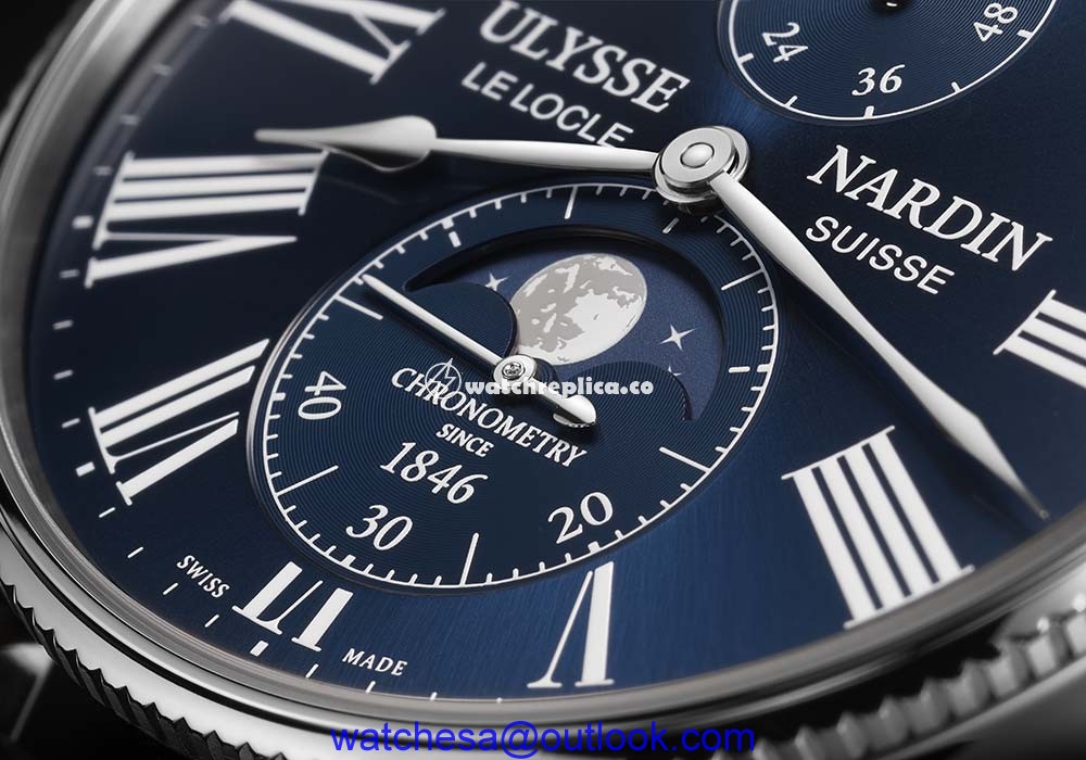 ulysse nardin marine torpilleur moonphase blue dial closeup
